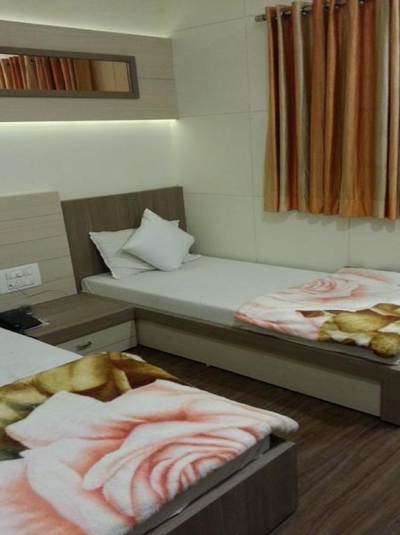 Hotel Oasis Мумбаї Номер фото