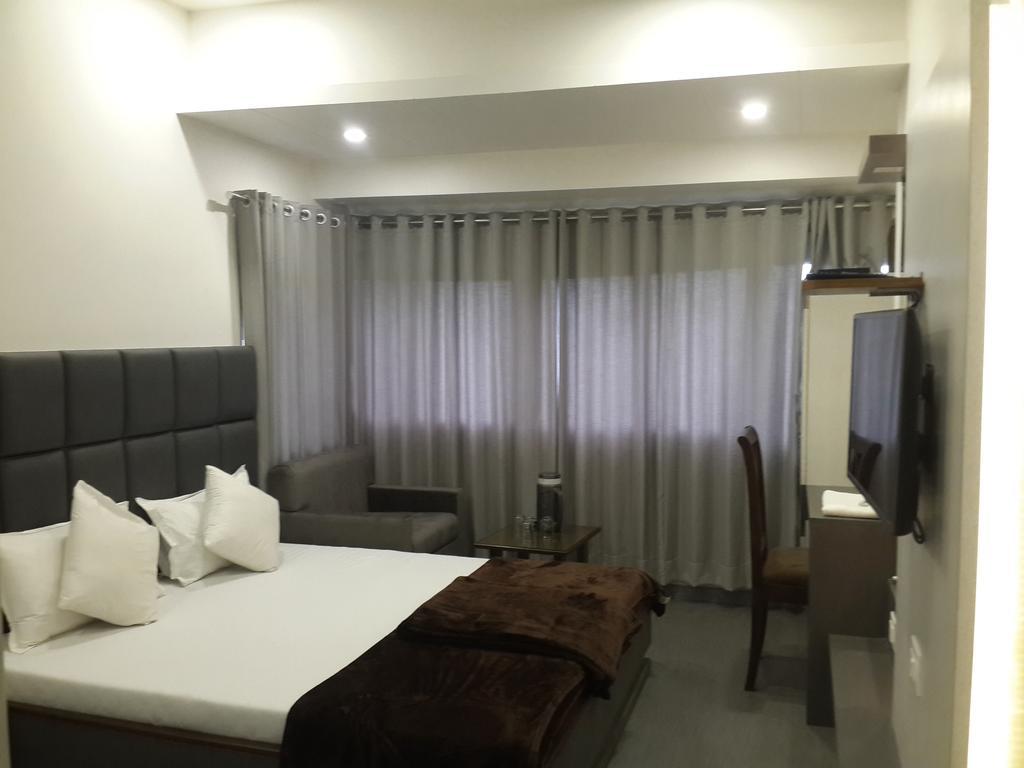 Hotel Oasis Мумбаї Номер фото