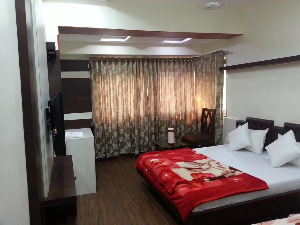 Hotel Oasis Мумбаї Номер фото